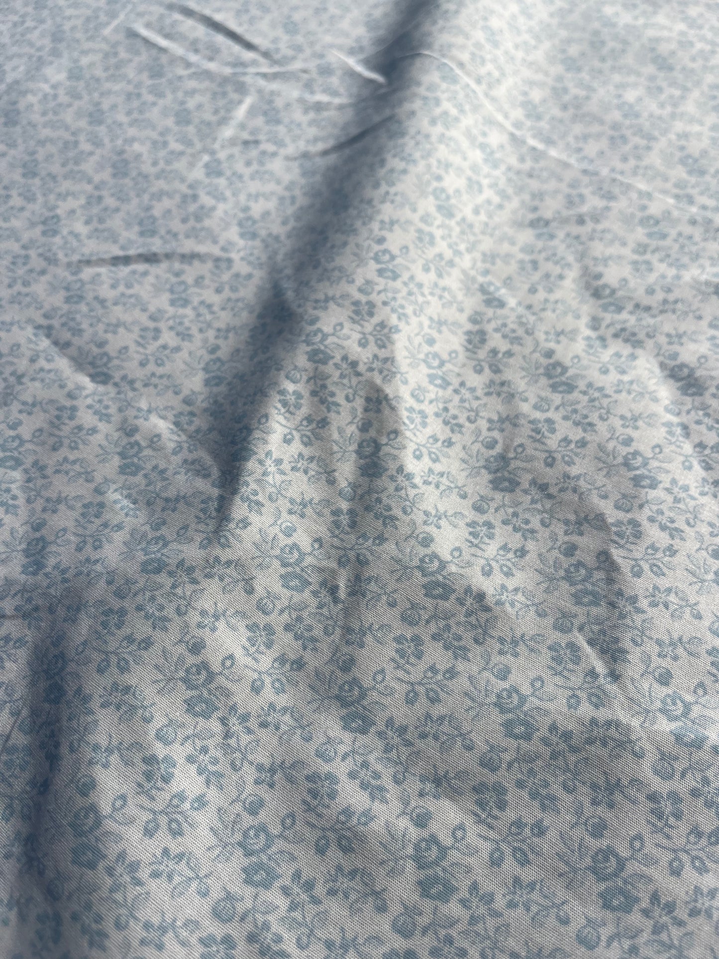 RW 057 poplin with small ice blue flowers