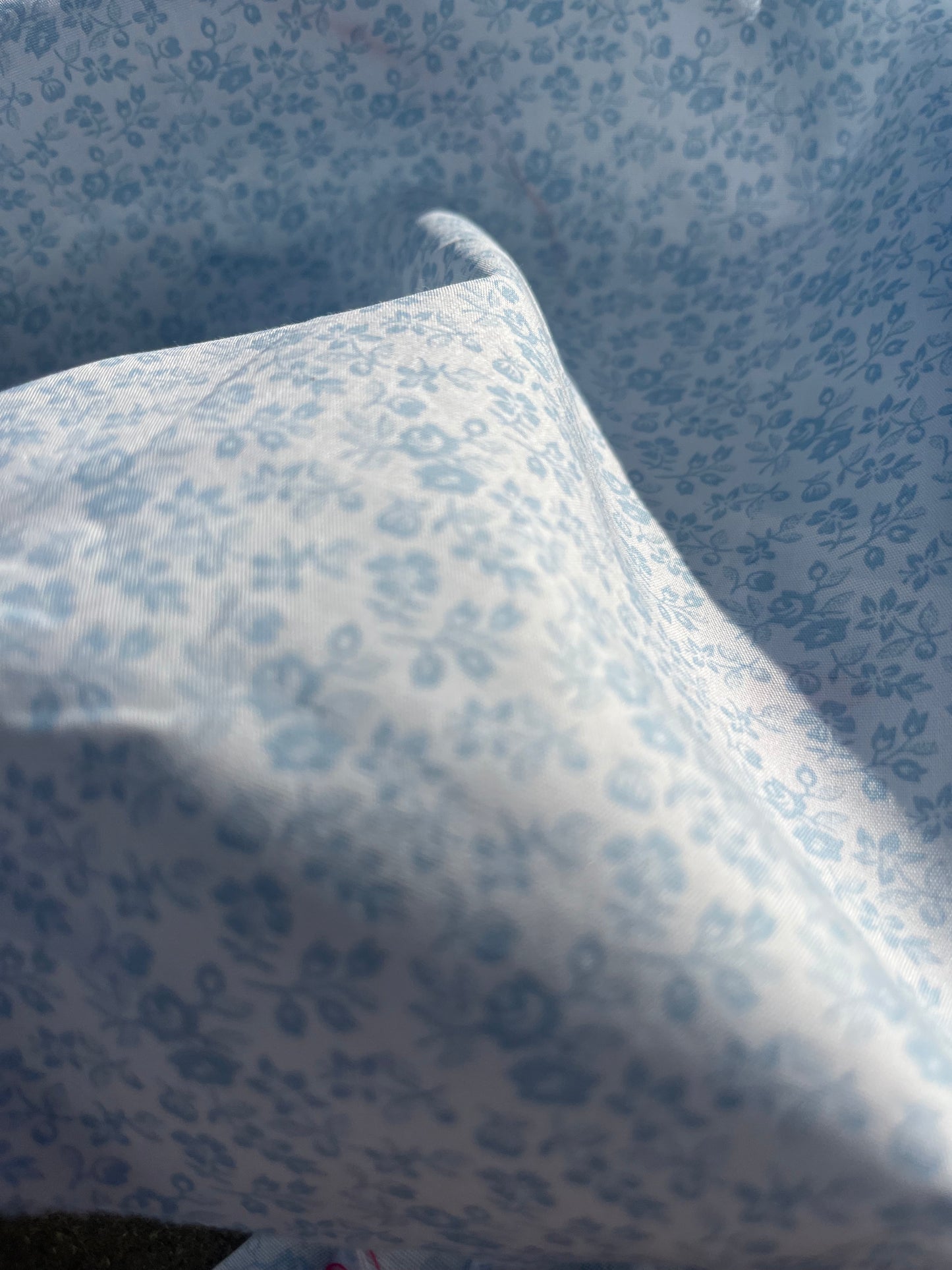 RW 057 poplin with small ice blue flowers