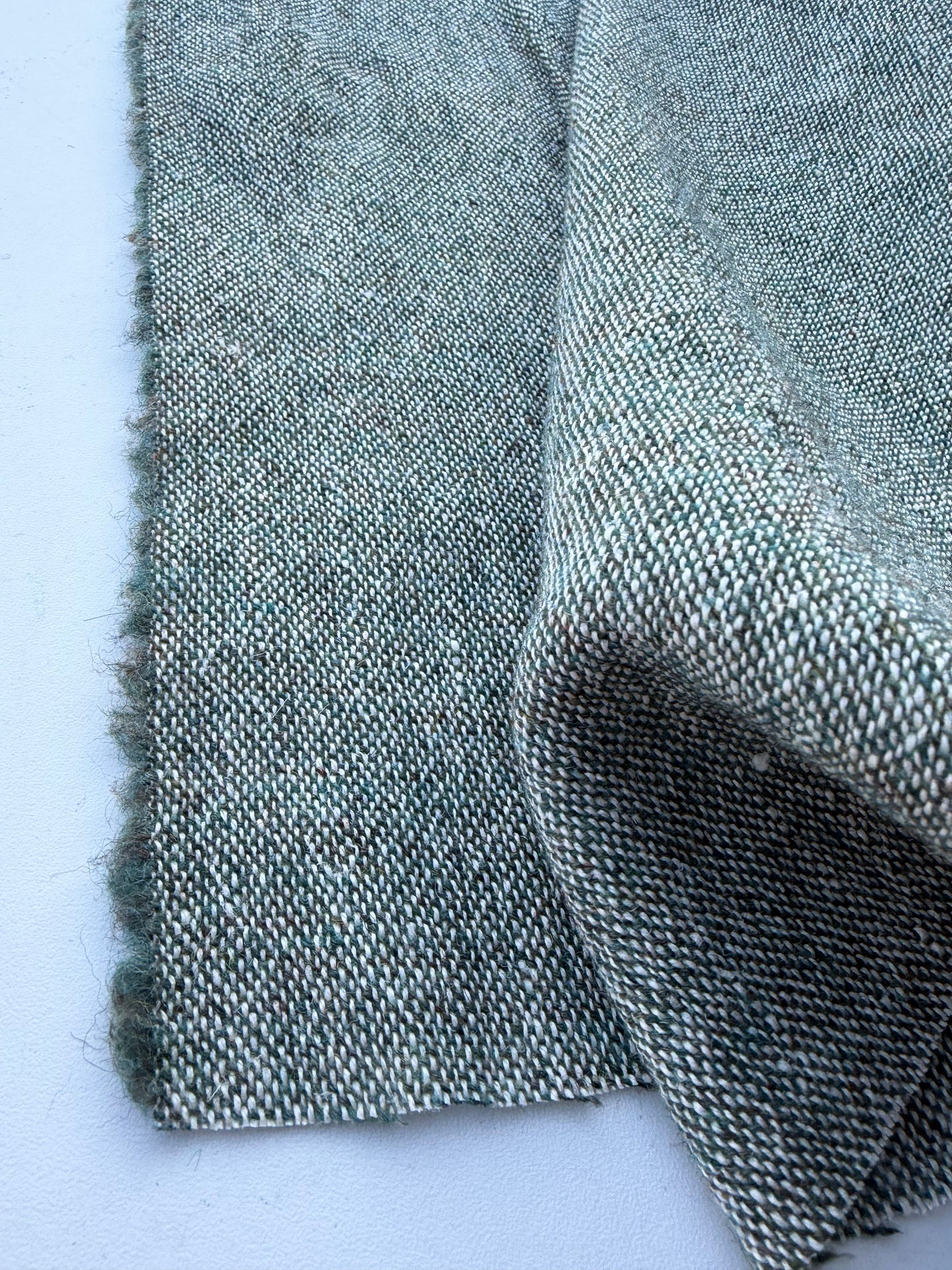 NED 018 green mélange wool drape