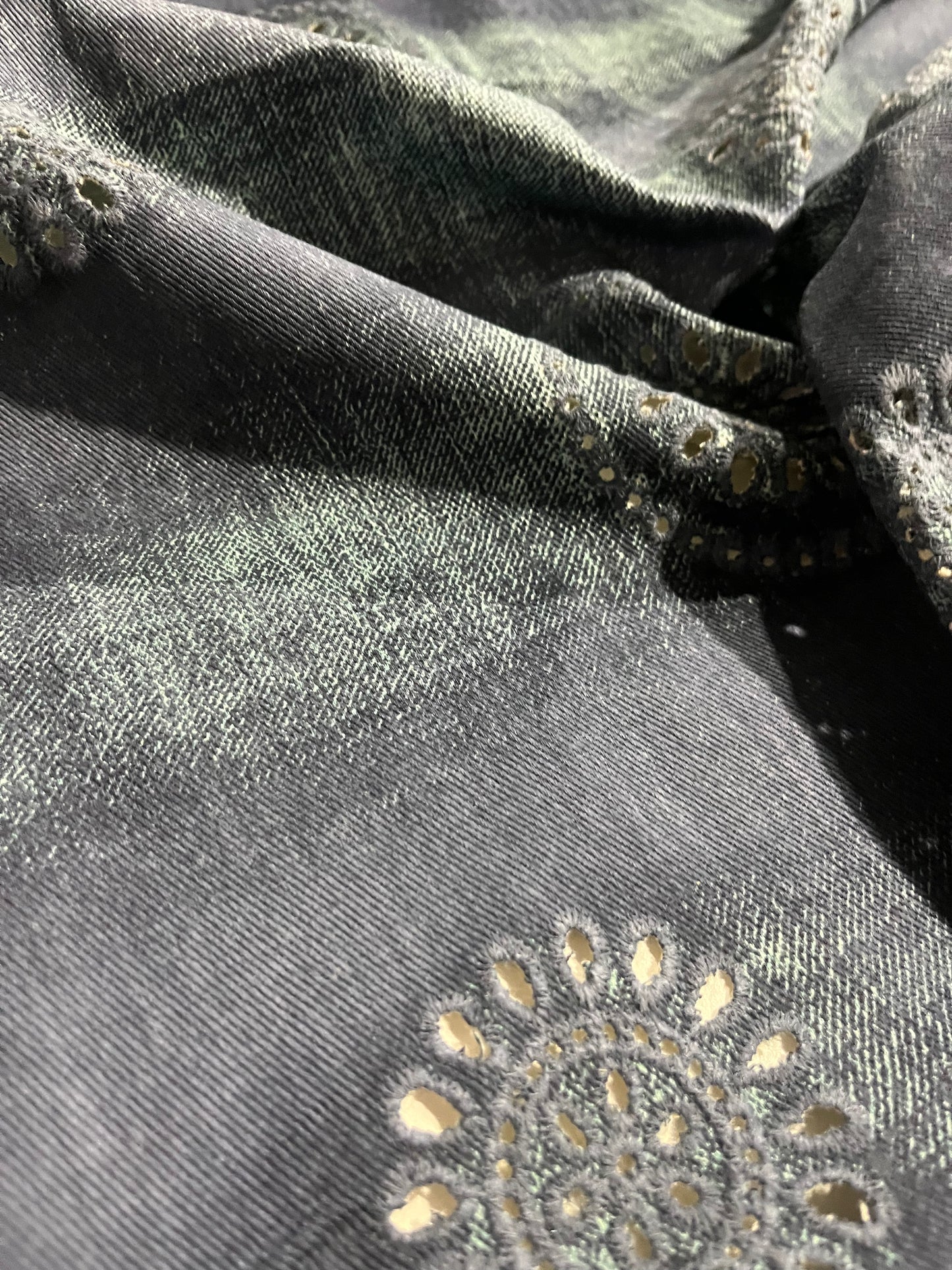 SHAFTY 008 embroidered denim with washed out effect.