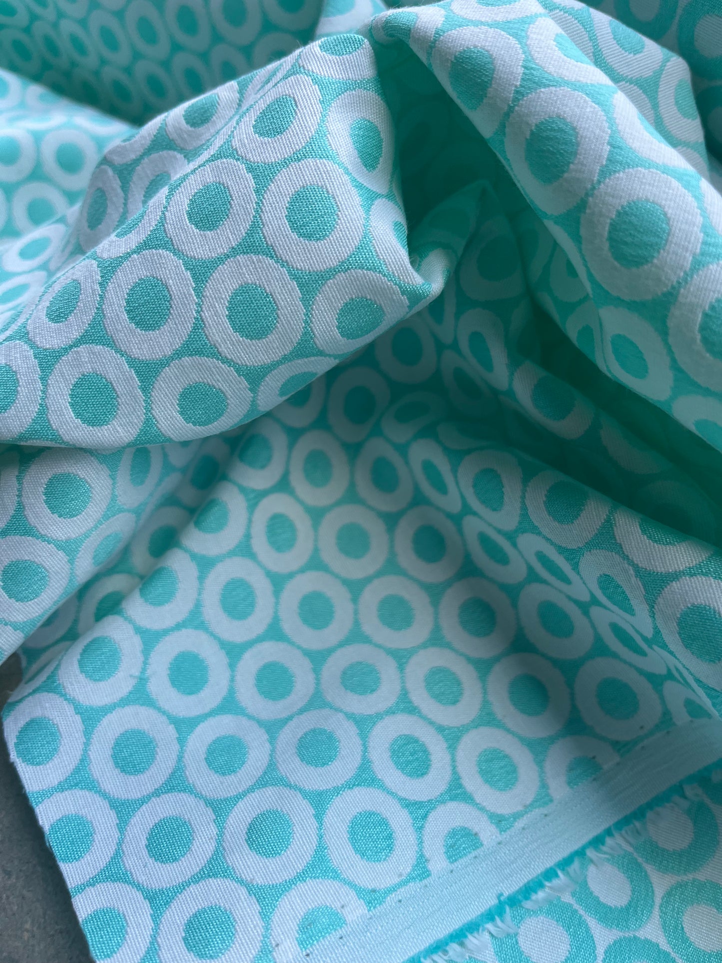 Jacques 005 cotton stretch jacquard soft green circles