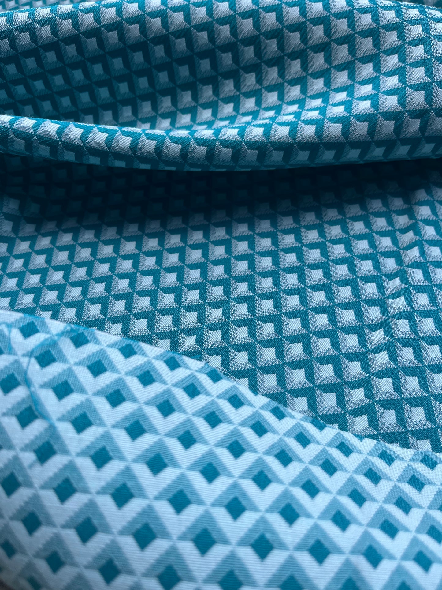 Jacques 010 cotton stretch jacquard petrol/white geometrical design