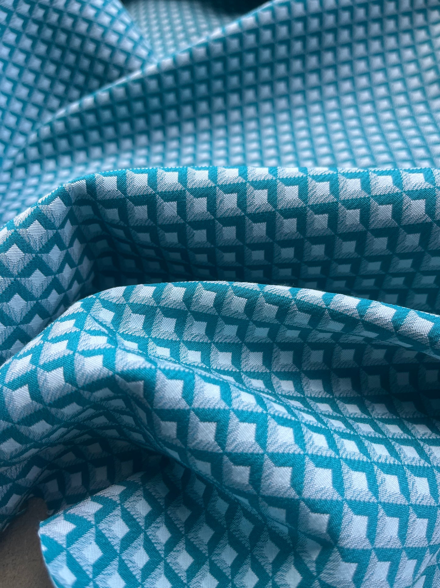 Jacques 010 cotton stretch jacquard petrol/white geometrical design