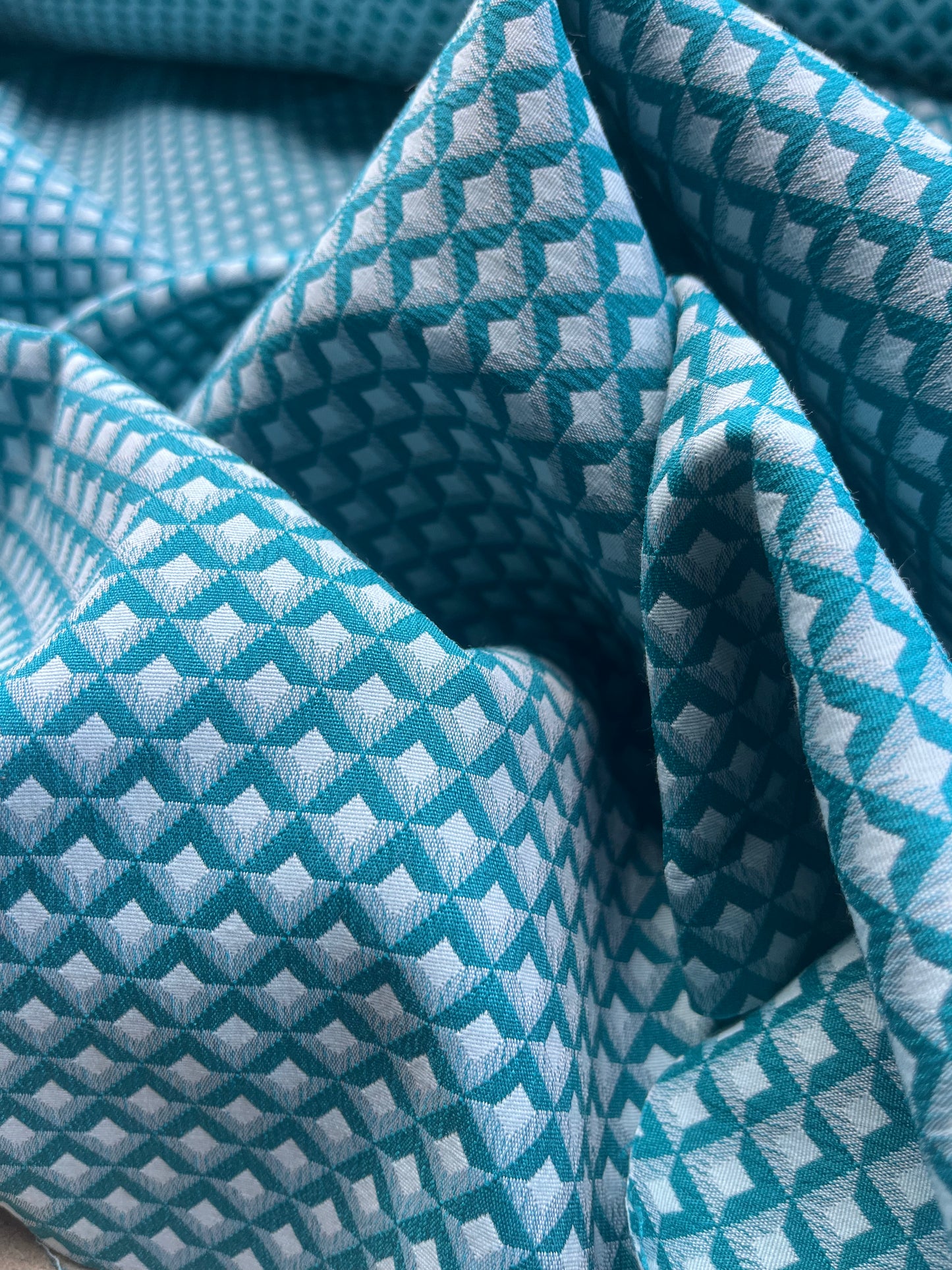 Jacques 010 cotton stretch jacquard petrol/white geometrical design