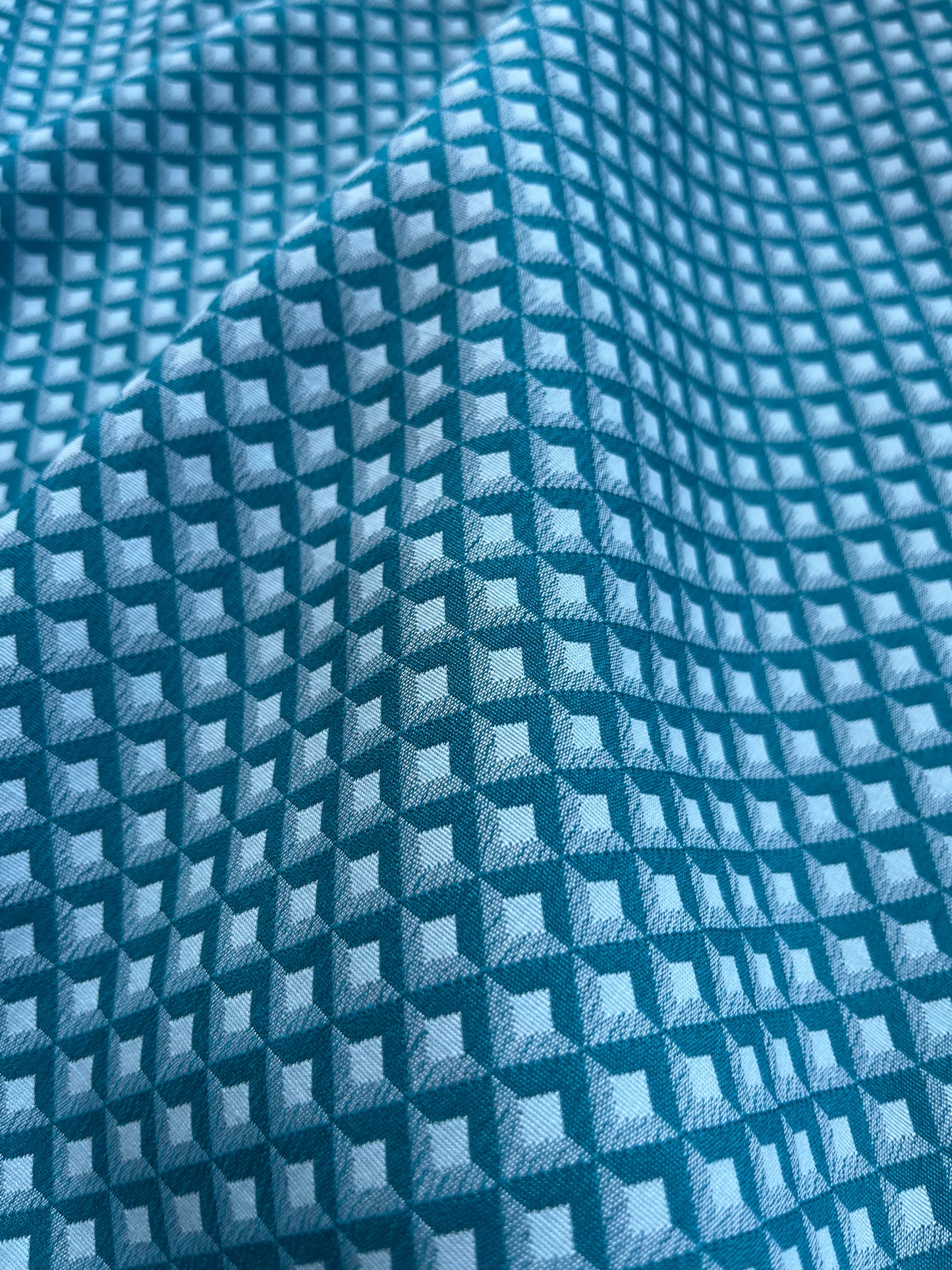Jacques 010 cotton stretch jacquard petrol/white geometrical design
