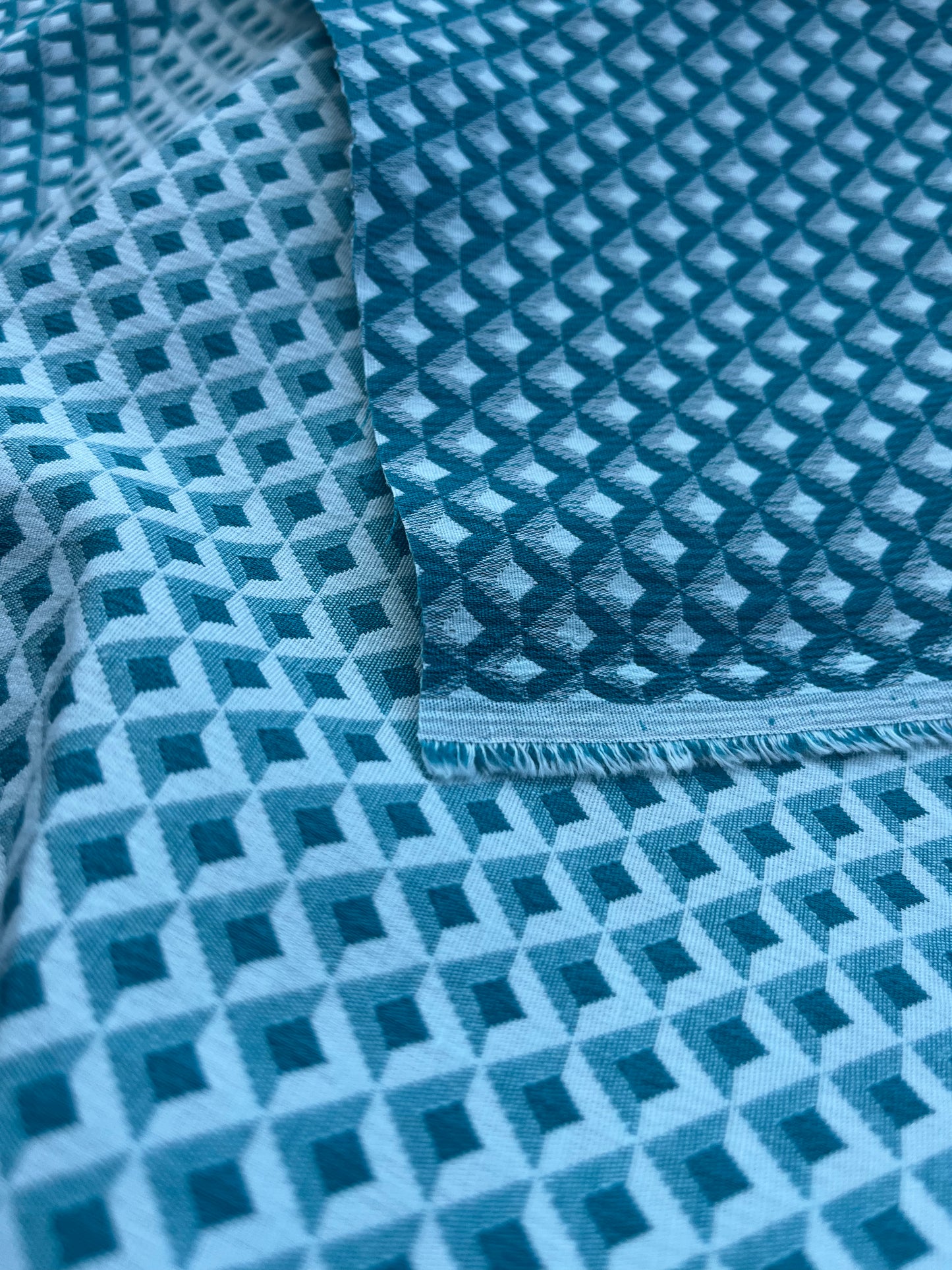 Jacques 010 cotton stretch jacquard petrol/white geometrical design