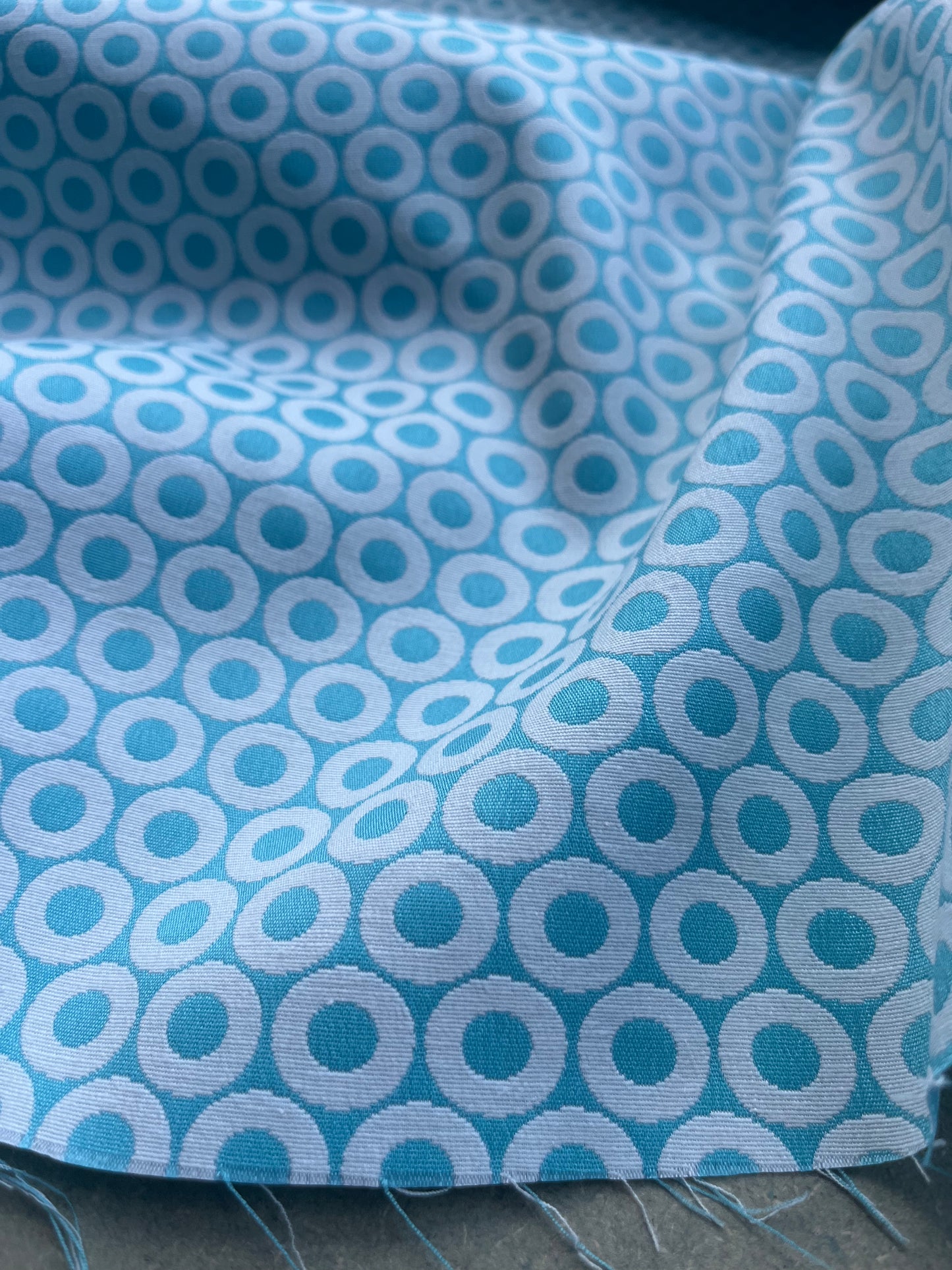 Jacques 011 cotton stretch jacquard petrol/white circles