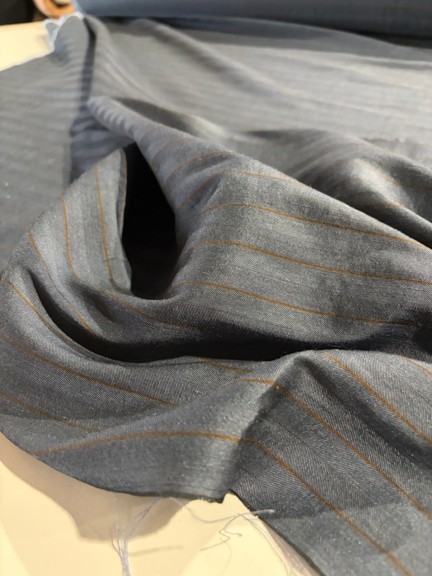 KRUSTY 021 indigo/rust shiny cotton suiting stripes