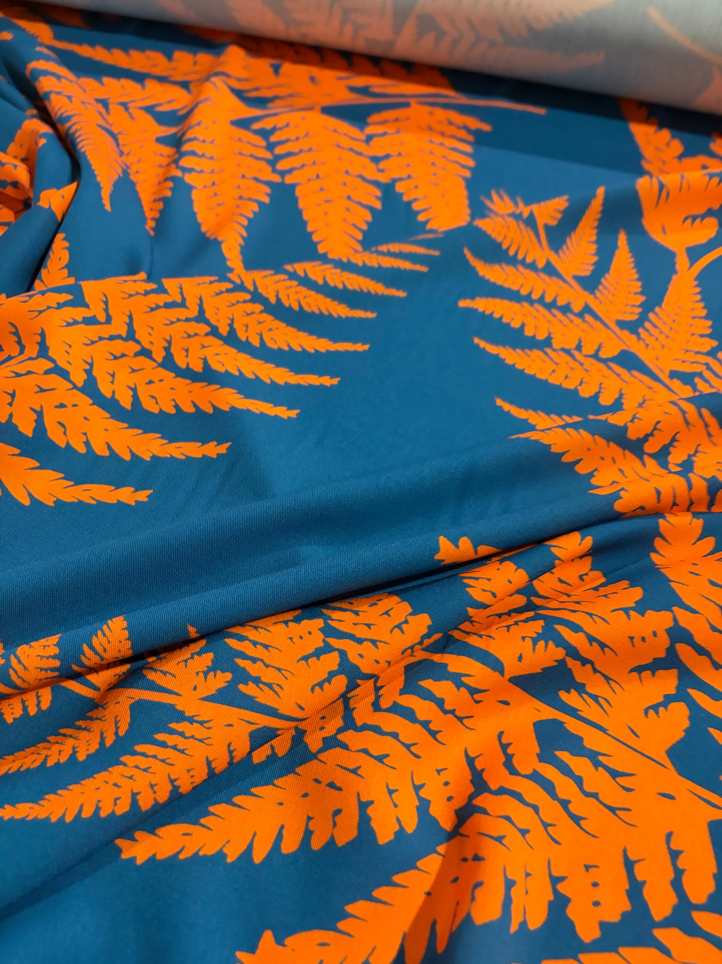 KRUSTY 022 petrol/orange viscose twill print