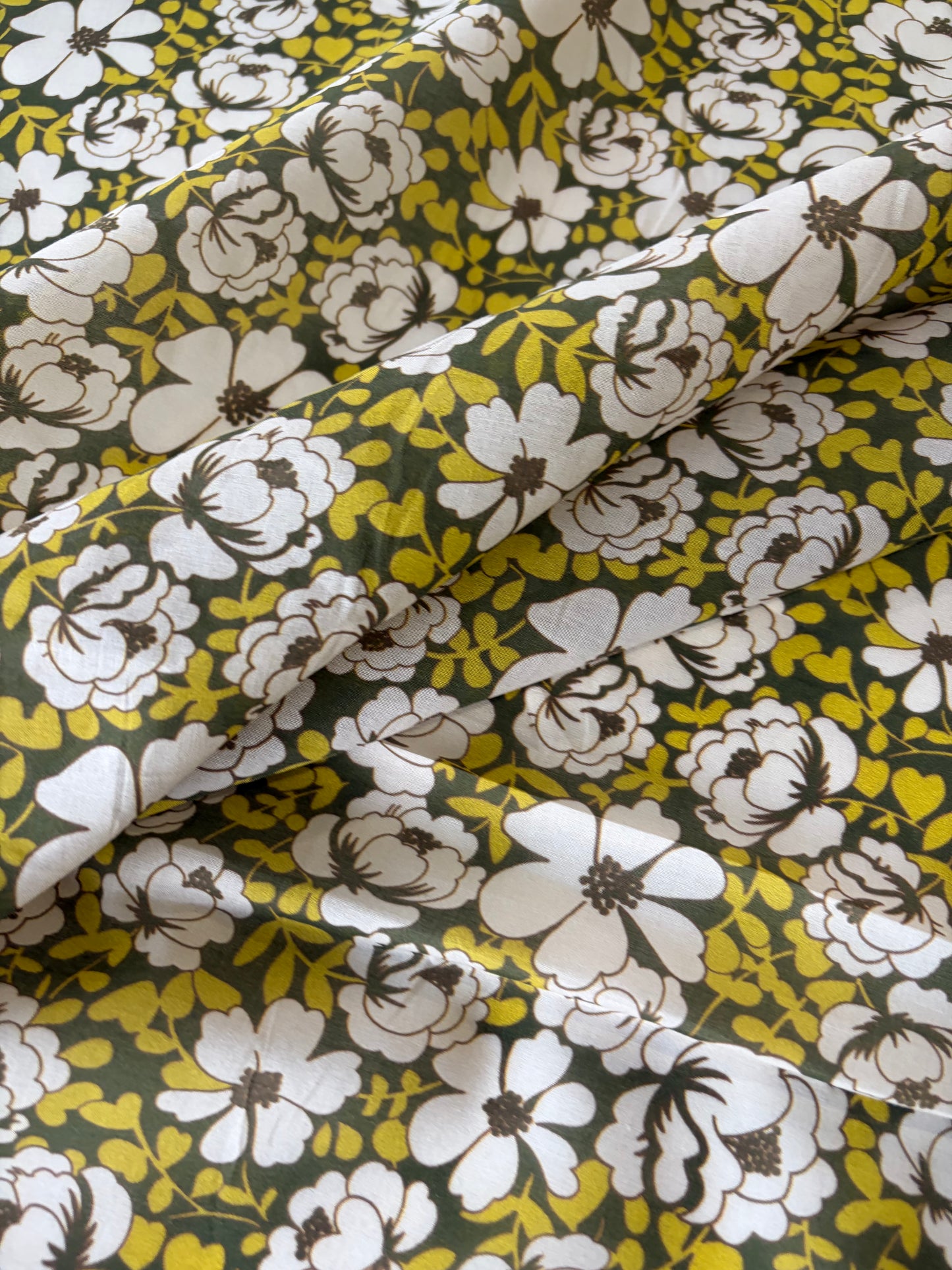 AL 011 cotton voile "curry/khaky flowers"