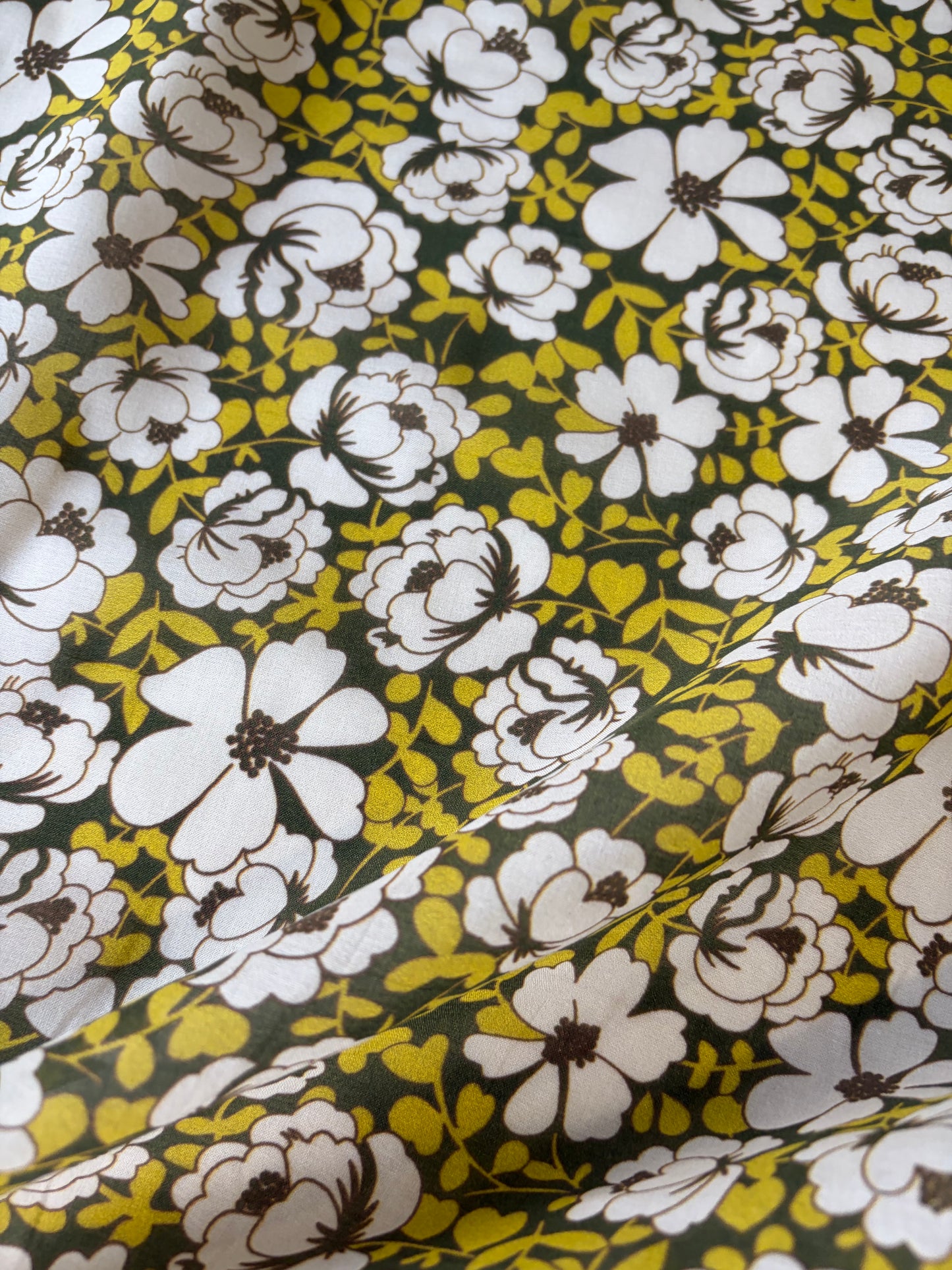 AL 011 cotton voile "curry/khaky flowers"