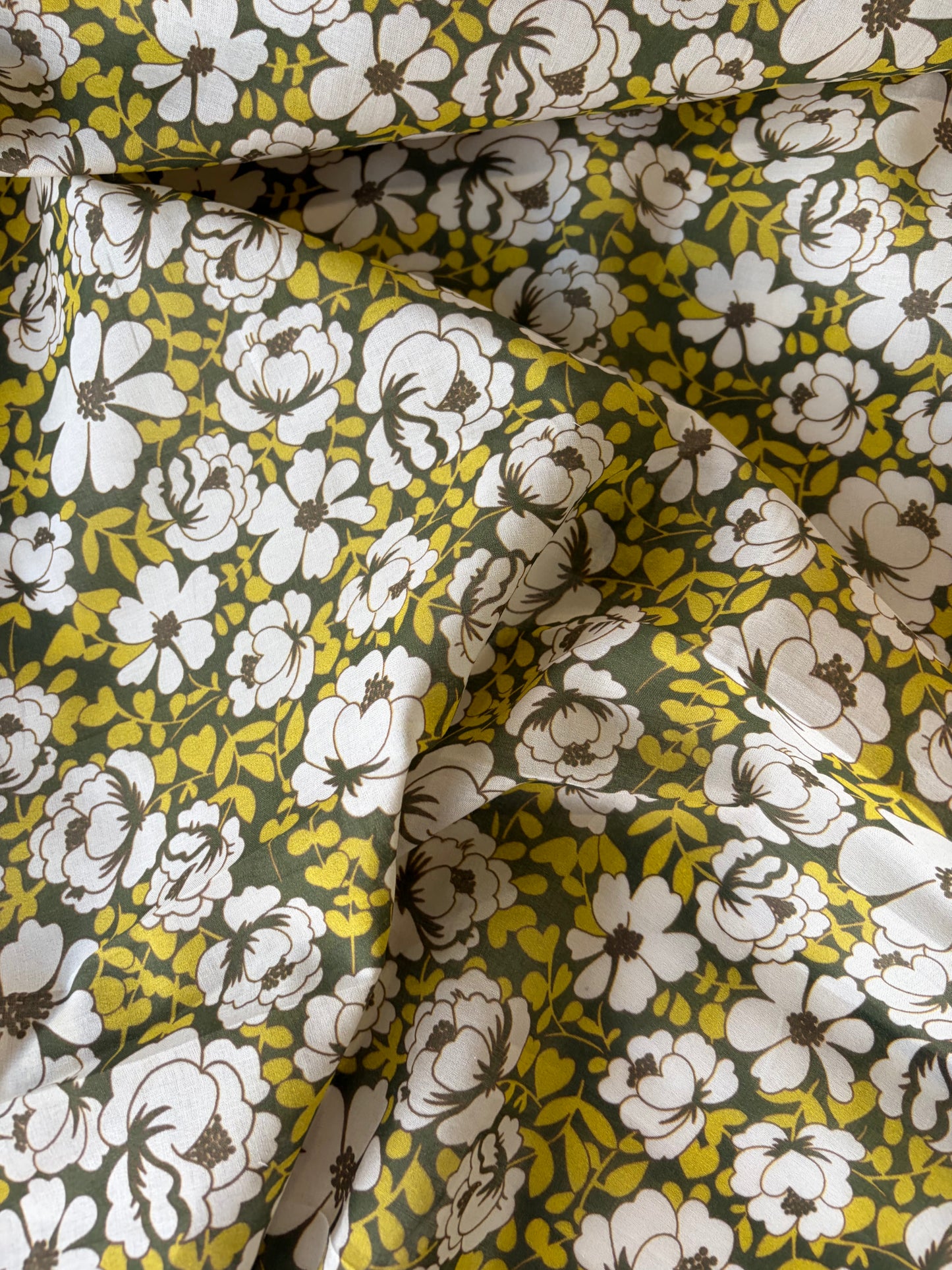 AL 011 cotton voile "curry/khaky flowers"