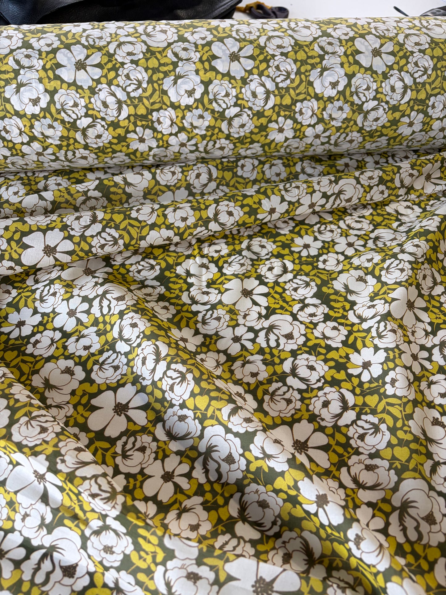AL 011 cotton voile "curry/khaky flowers"