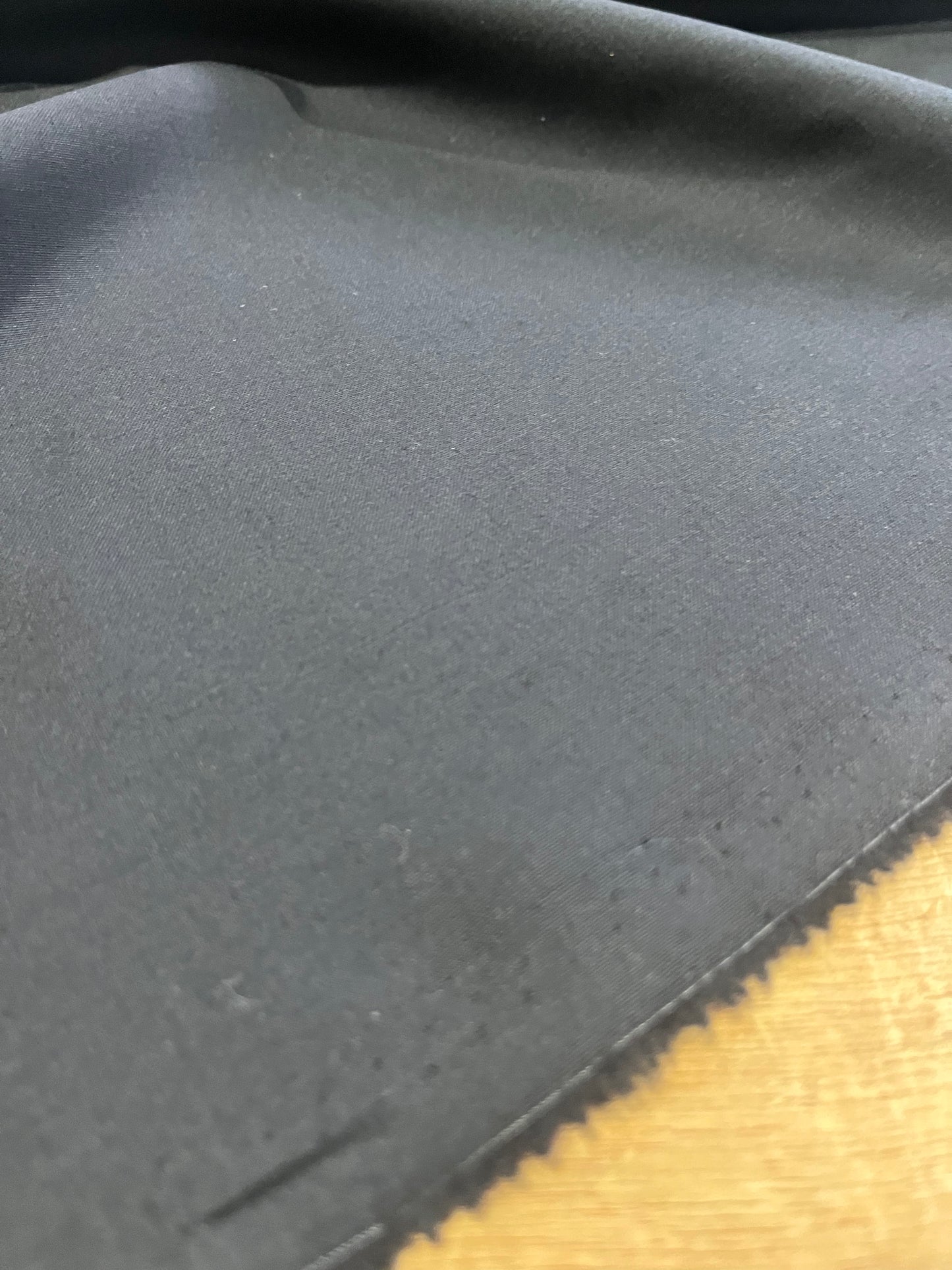 E02 POM 1010 black suiting fabric