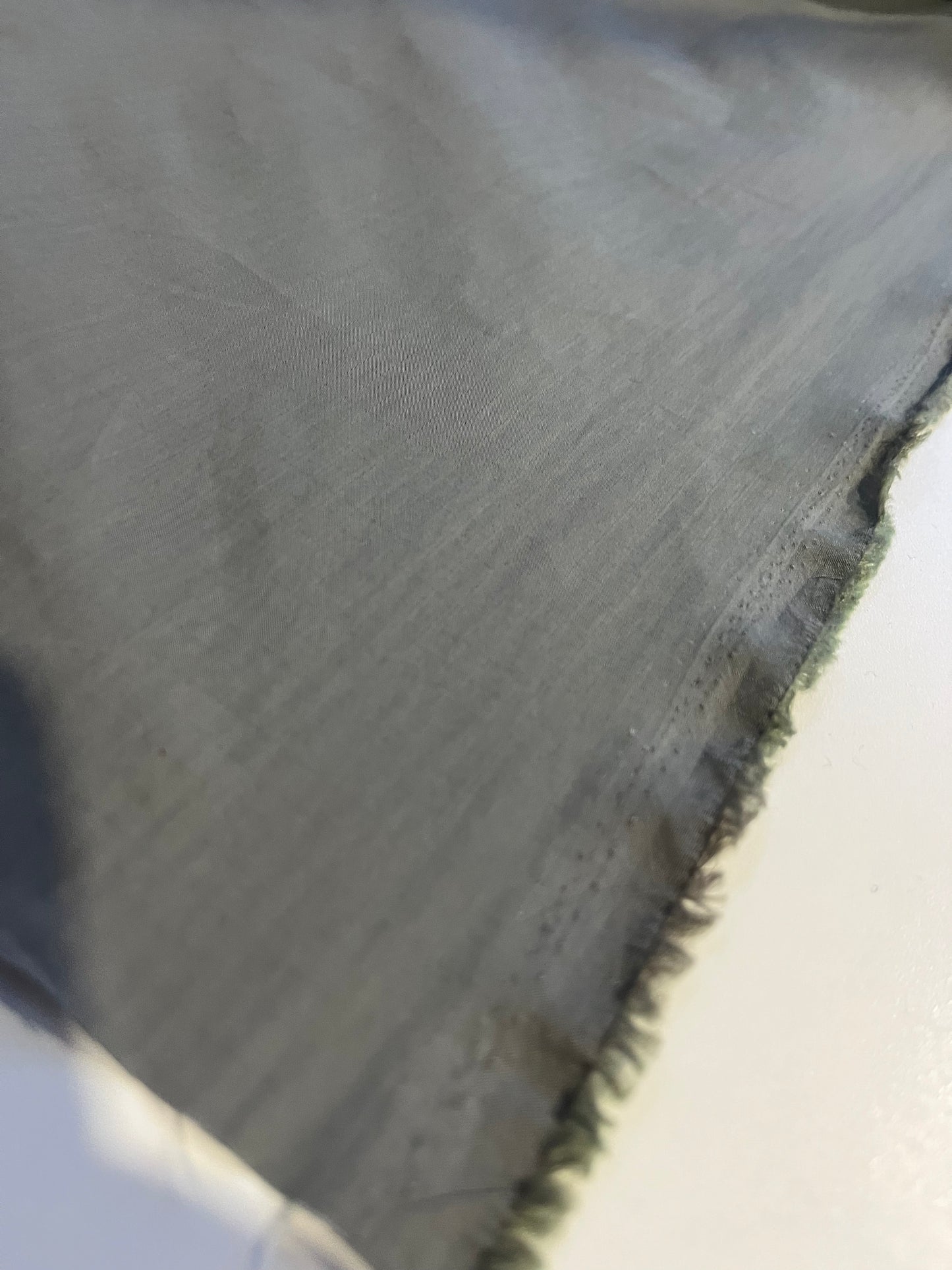 BASILE 045 coated cotton ribstop papertouch grey/green