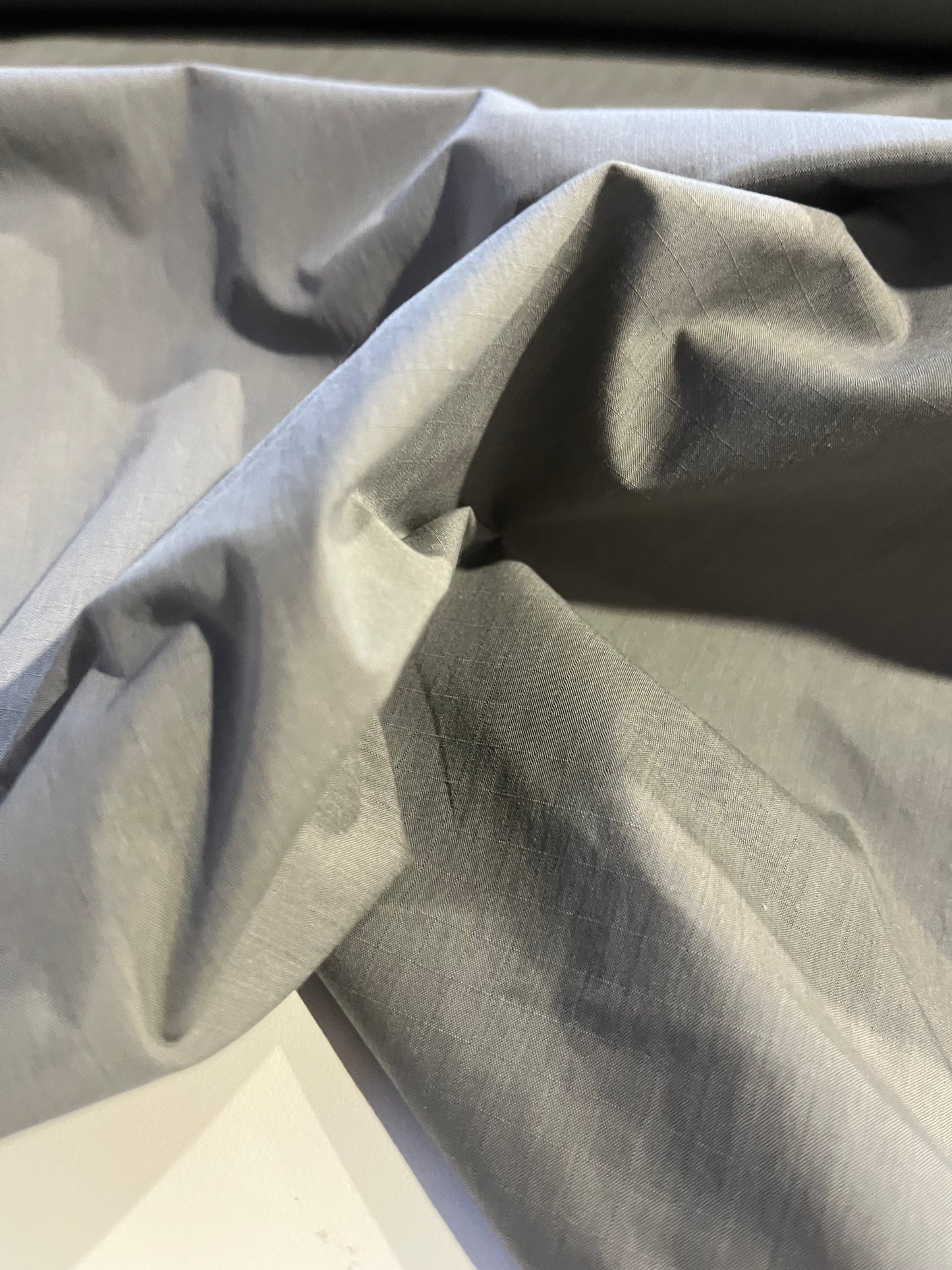 BASILE 045 coated cotton ribstop papertouch grey/green