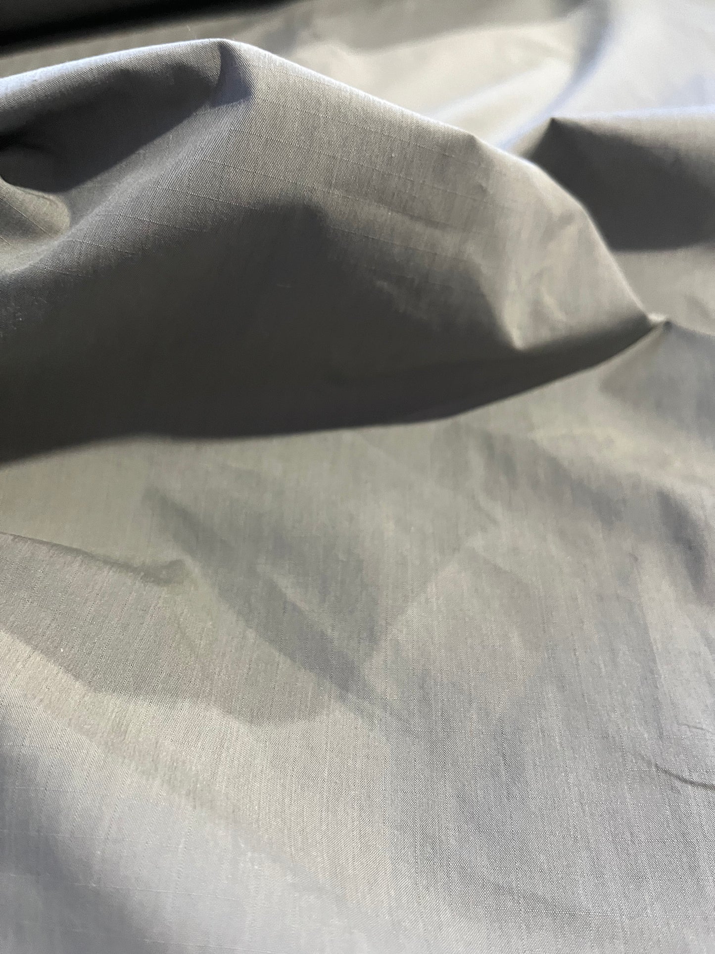 BASILE 045 coated cotton ribstop papertouch grey/green