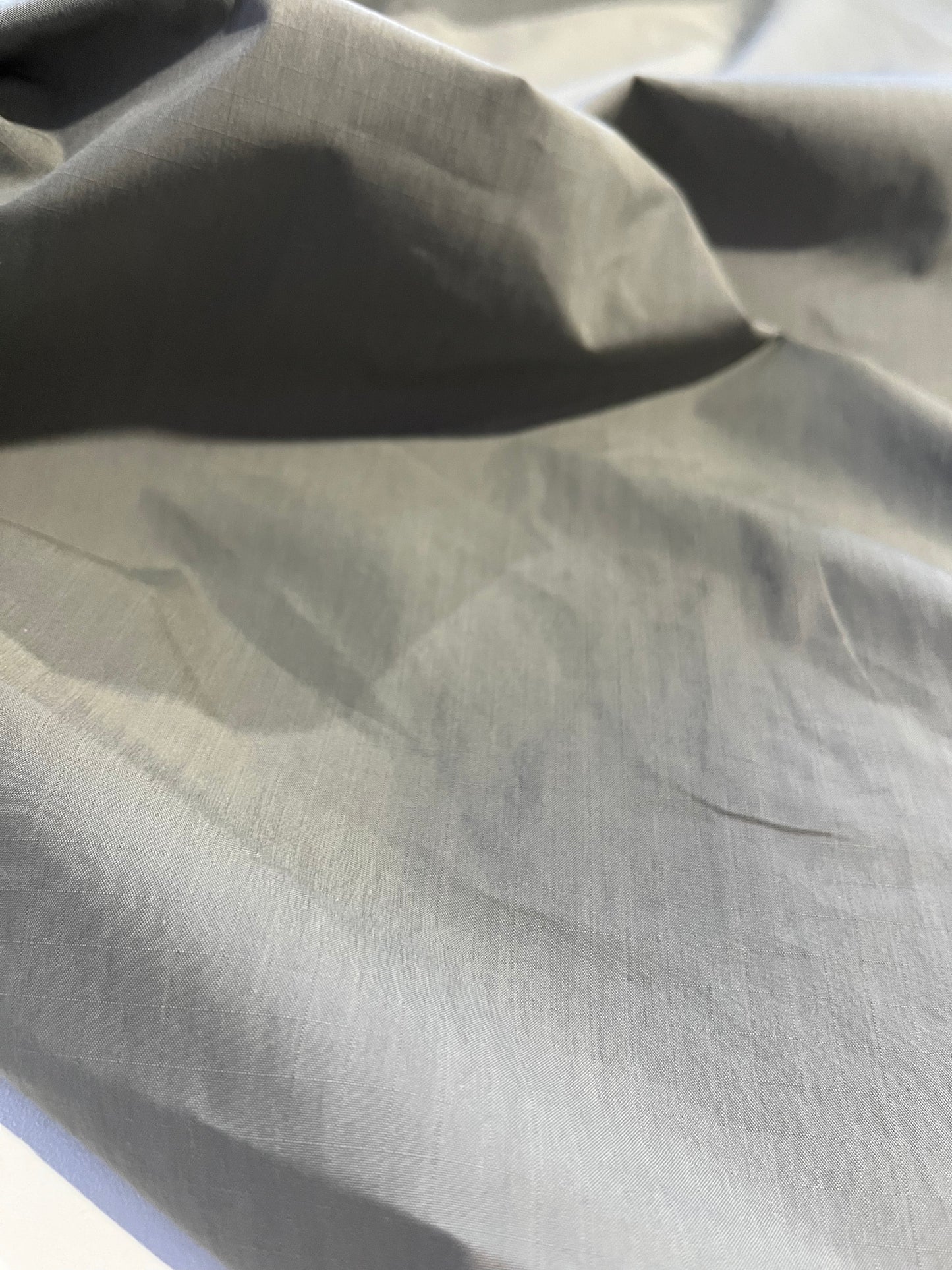 BASILE 045 coated cotton ribstop papertouch grey/green