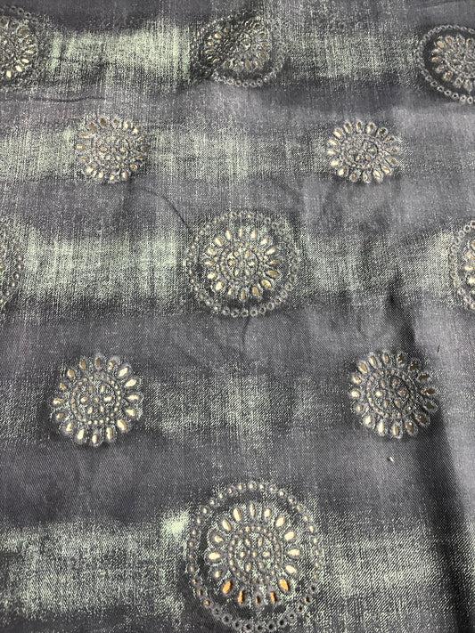 SHAFTY 008 embroidered denim with washed out effect.