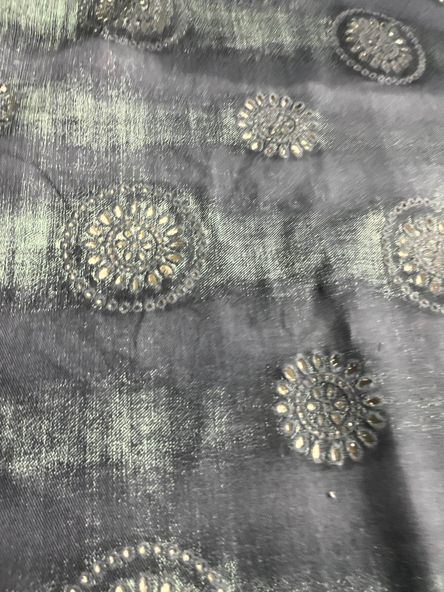 SHAFTY 008 embroidered denim with washed out effect.