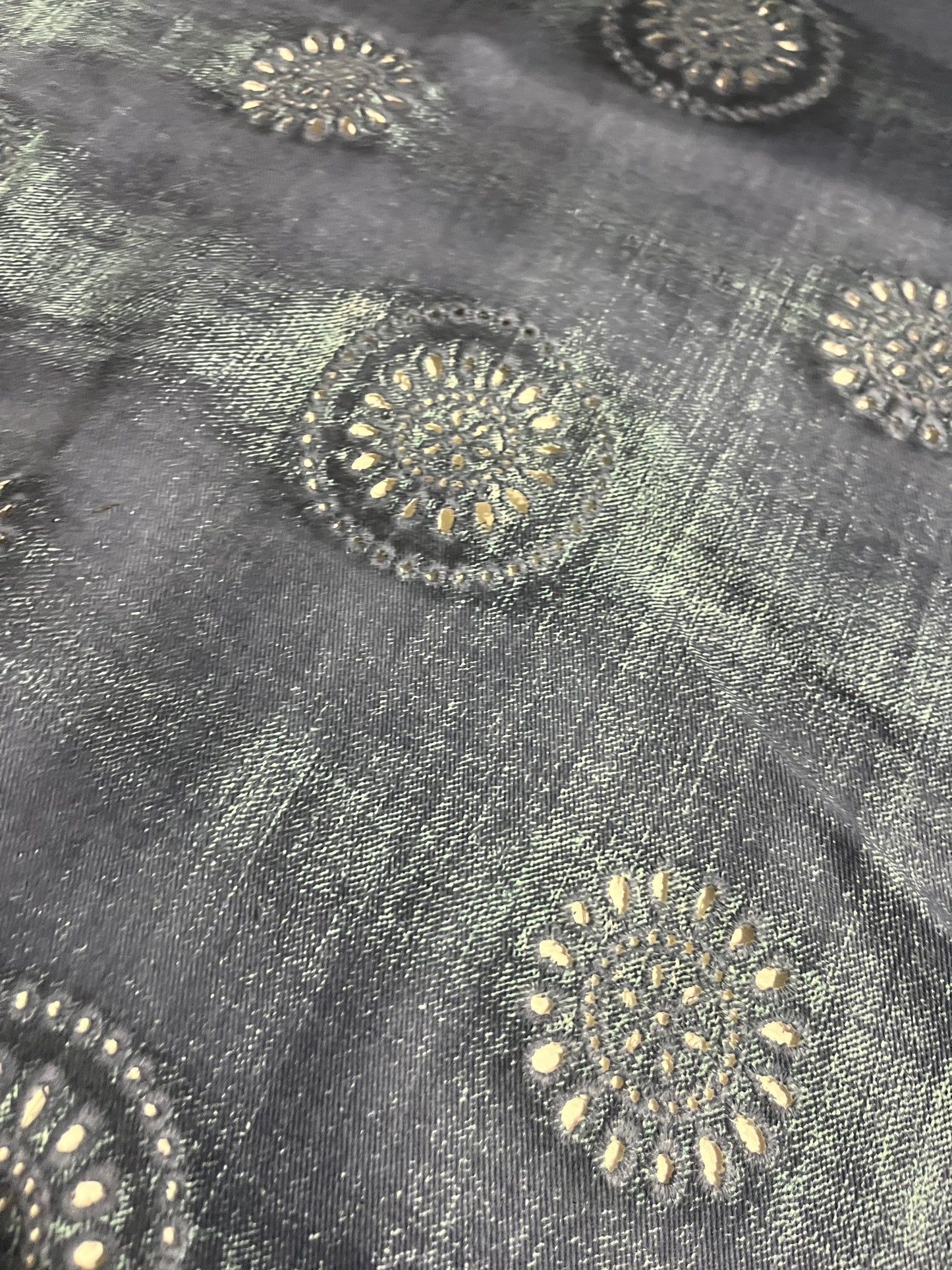 SHAFTY 008 embroidered denim with washed out effect.