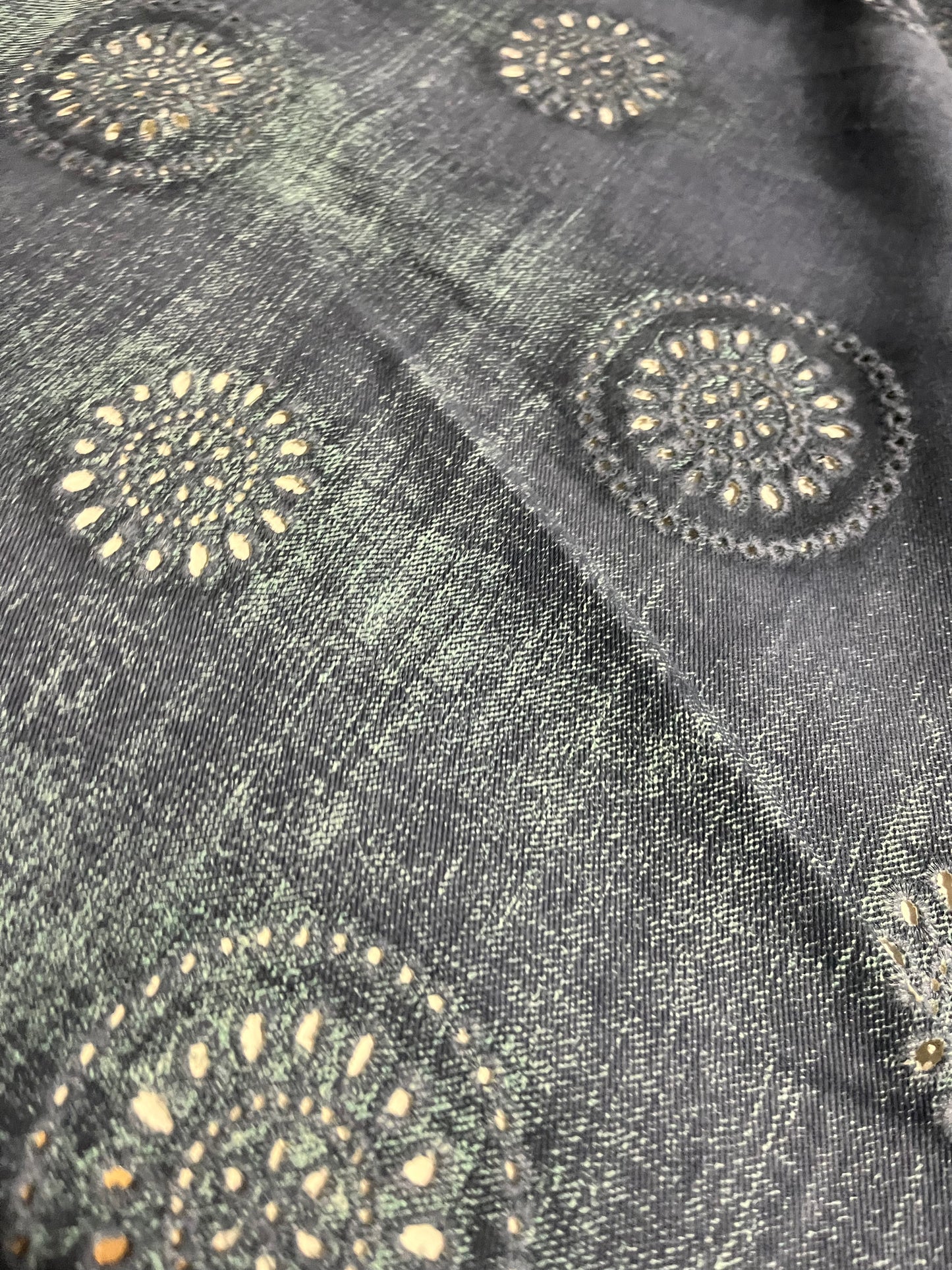 SHAFTY 008 embroidered denim with washed out effect.