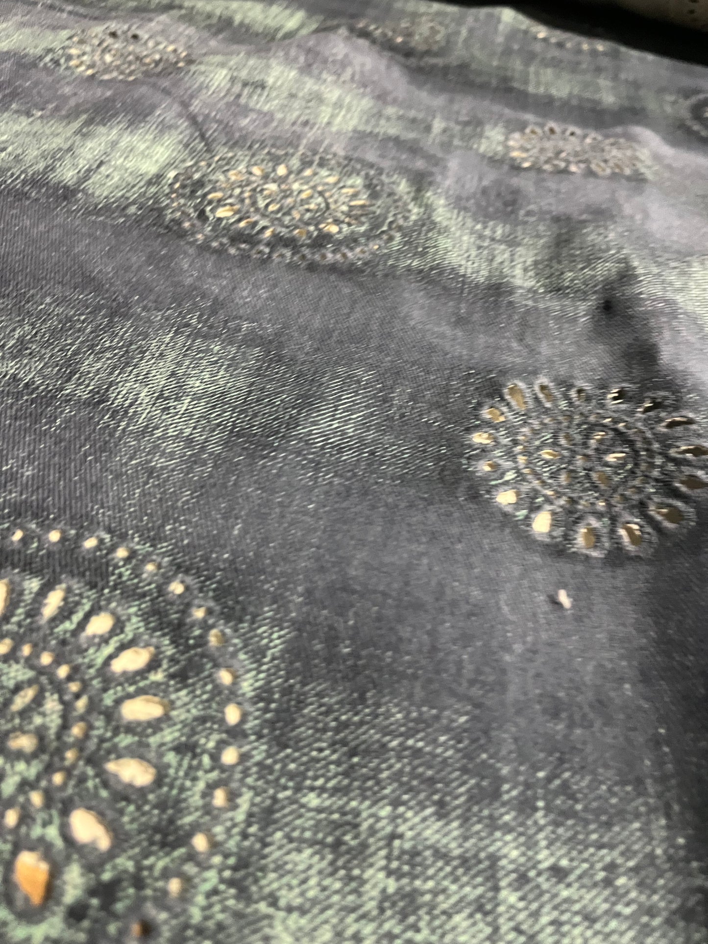 SHAFTY 008 embroidered denim with washed out effect.