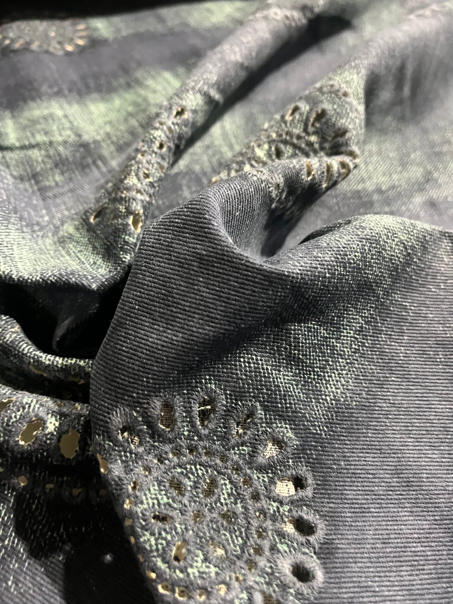 SHAFTY 008 embroidered denim with washed out effect.