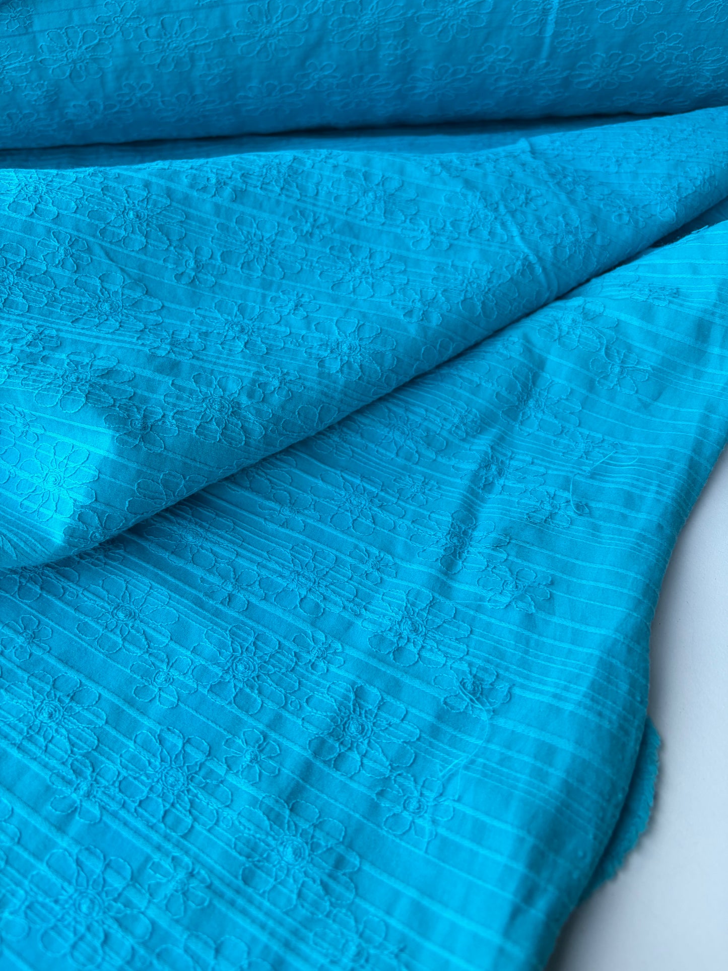 TINO 019 stretch embroidery turquoise