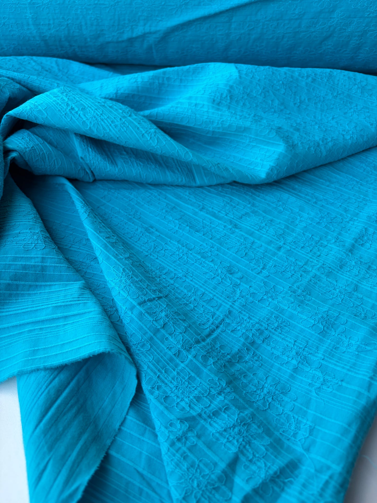 TINO 019 stretch embroidery turquoise