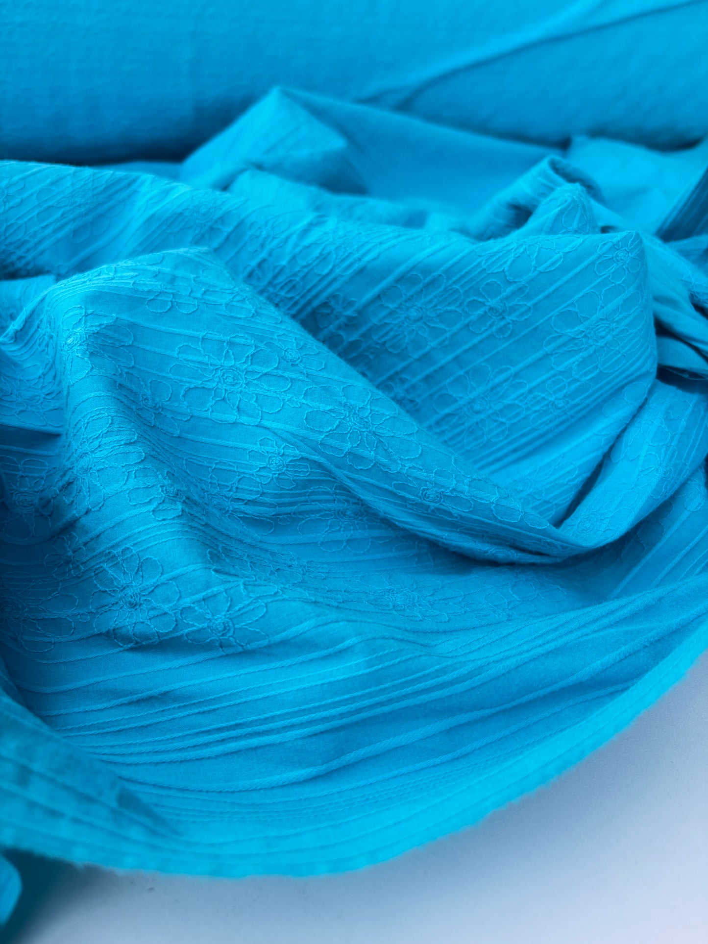 TINO 019 stretch embroidery turquoise
