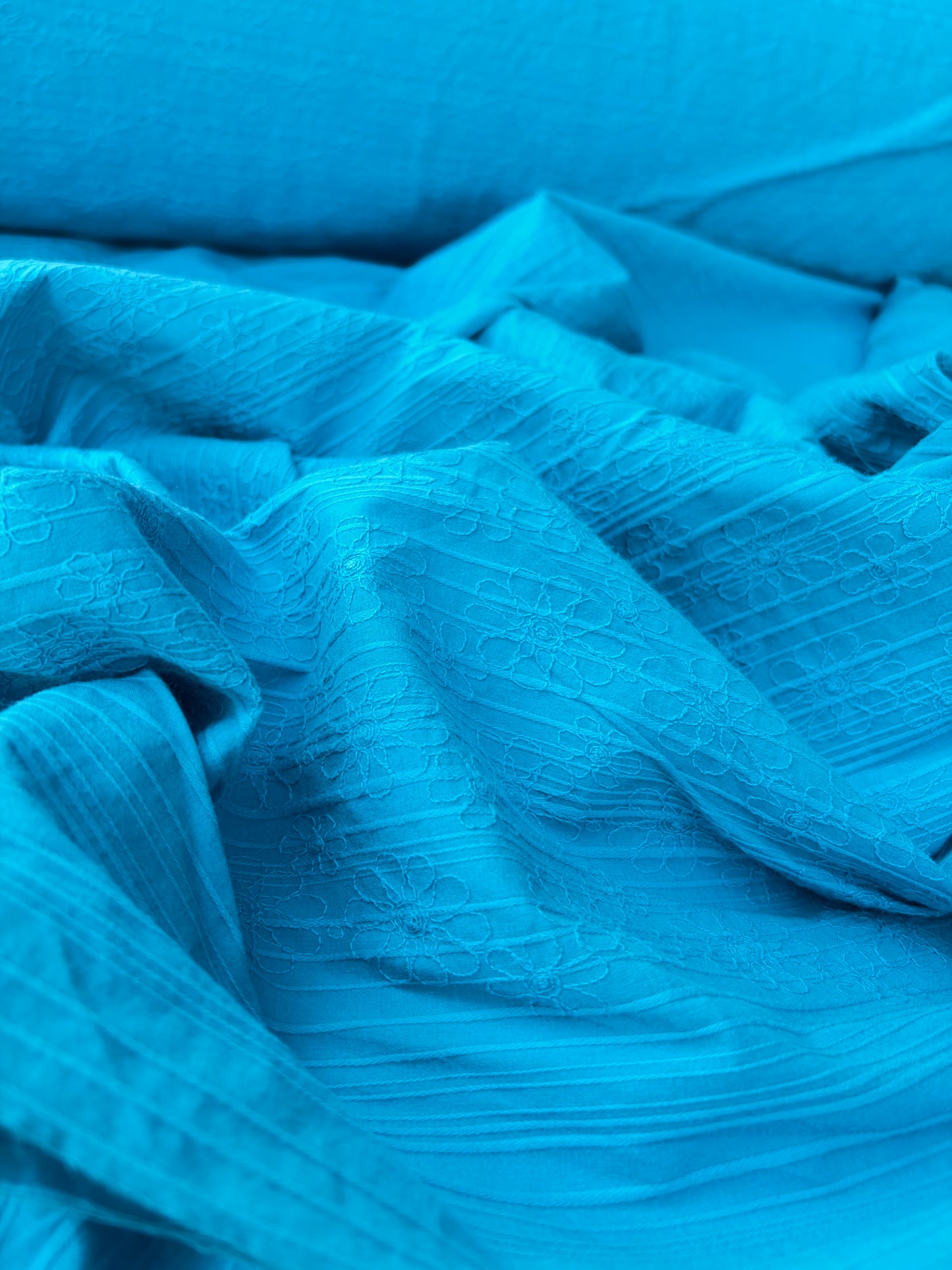 TINO 019 stretch embroidery turquoise