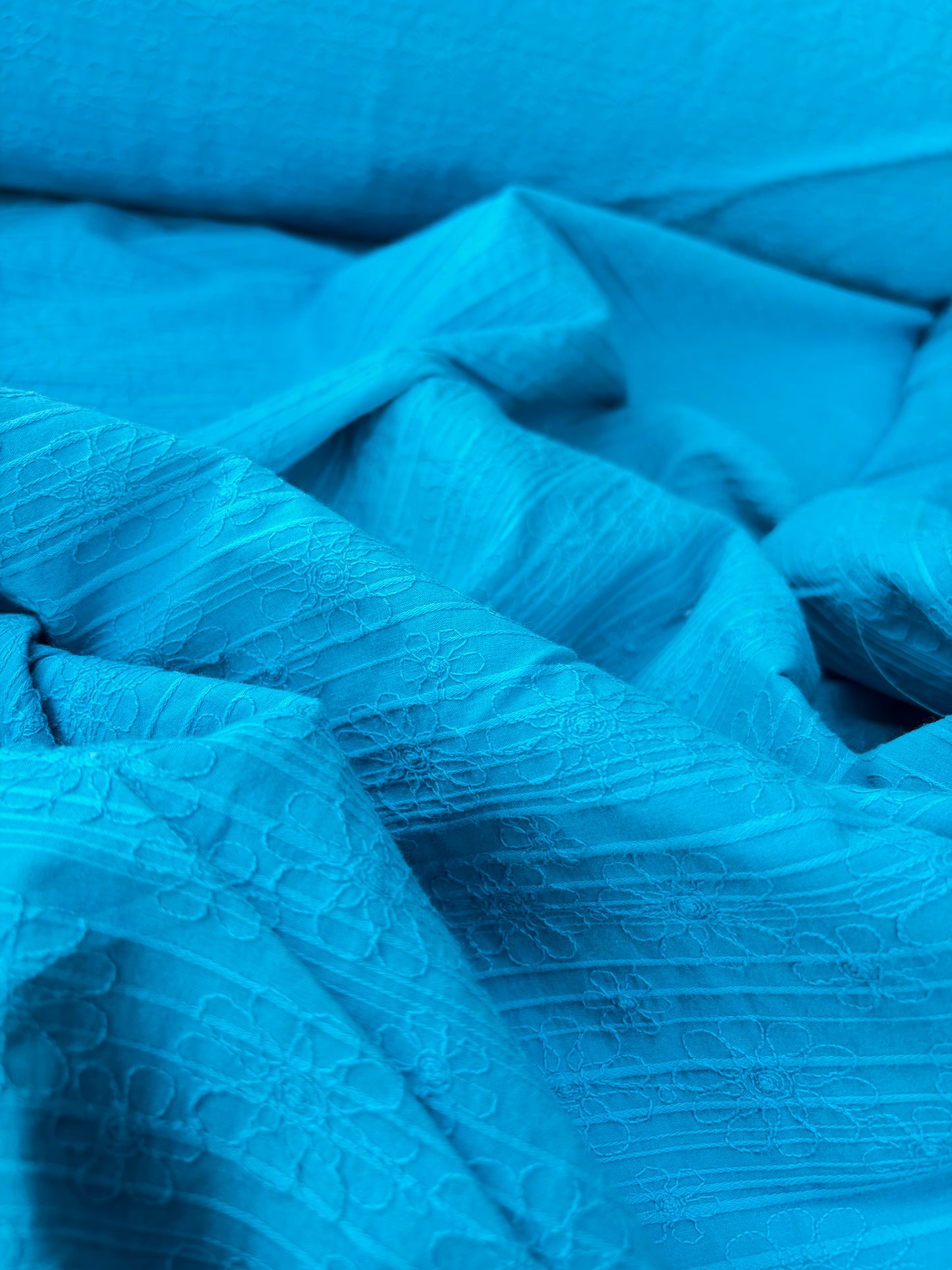 TINO 019 stretch embroidery turquoise
