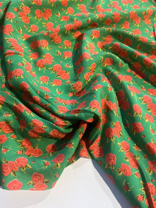 XII 058 viscose print red roses on green field