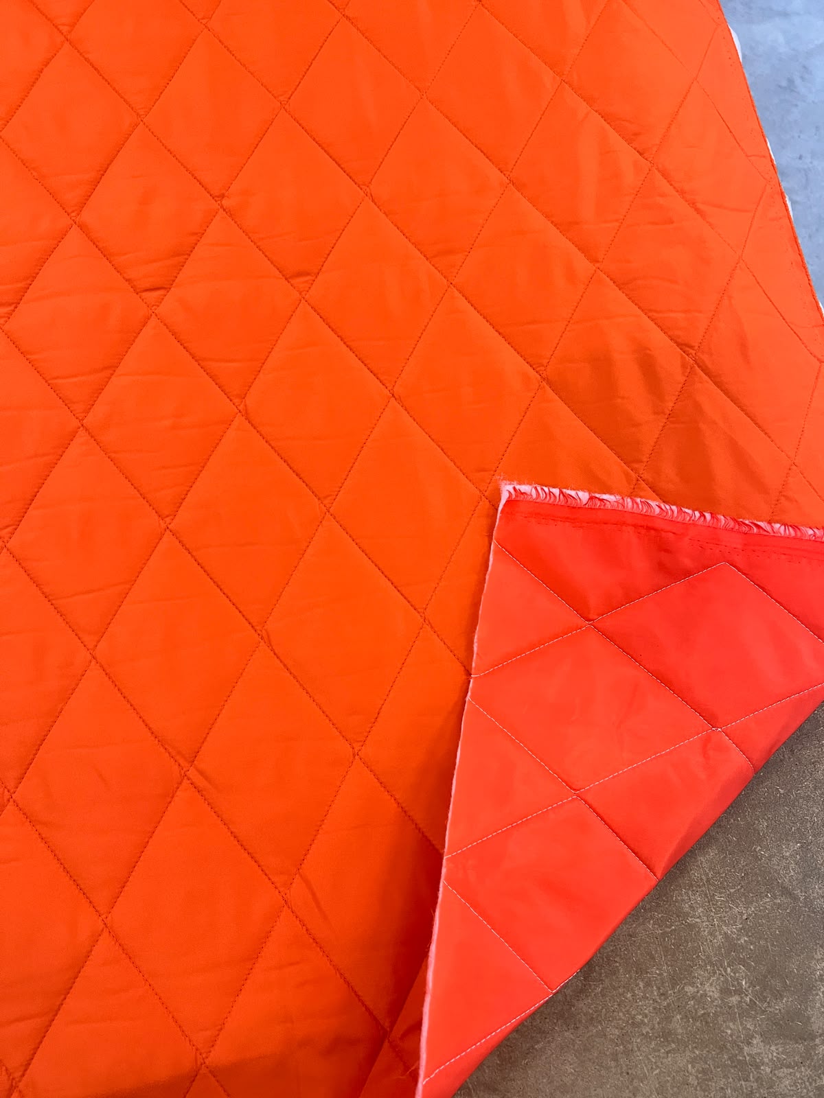 ZOE-069 orange diamond quilted puffer