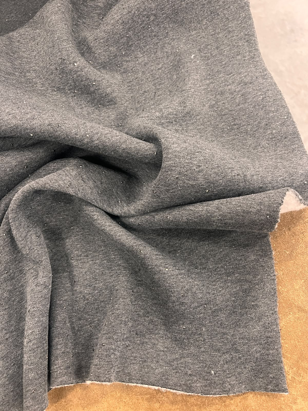 ZOE 091  dark grey marl all over studs fleece